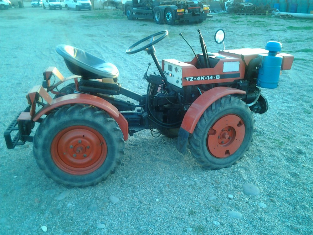Tractor articulat 4x4 tz-4k-14b diesel 660cm3 | arhiva Okazii.ro
