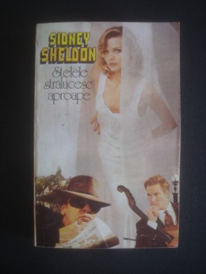 SIDNEY SHELDON - STELELE STRALUCESC APROAPE foto