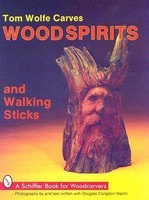Tom Wolfe Carves Wood Spirits and Walking Sticks foto
