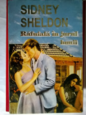 Sidney Sheldon - Rafuiala in jurul lumii foto