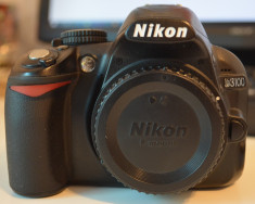 Vand nikon D3100 body only + accesorii (motiv: upgrade) foto