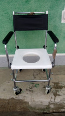 Scaun cu rotile pentru persoane cu dezabilitati foto