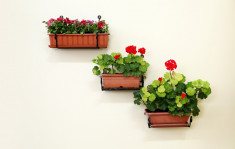 Suport de perete pentru jardiniere foto