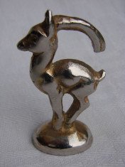 Piesa din metal argintat zodia capricorn foto