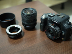 Camera foto mirrorless Panasonic Lumix G1 + 2 obiective si accesorii foto