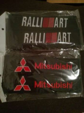 Suport tip bandana pentru centura de siguran?a. Model Ralliart sau Mitsubishi foto