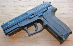 Pistol Airsoft Replica CyberGun Sig Sauer SP2022 CO2 metal slide foto