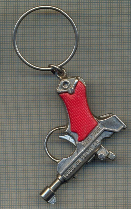 K 484 BRELOC PENTRU COLECTIONARI -PISTOLET MINIATURA, STILIZAT -LUGER -UK DESIGN