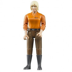 Figurina femeie cu pantaloni maro foto