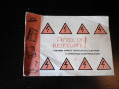 Pericol de electrocutare - Pliant pentru protectie utilizatori, 1968 foto