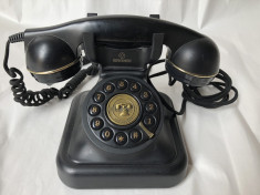 Telefon fix ,vechi,stil vintage,Brondi foto