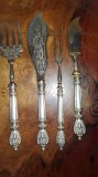 Tacamuri manere argint, Set tacamuri