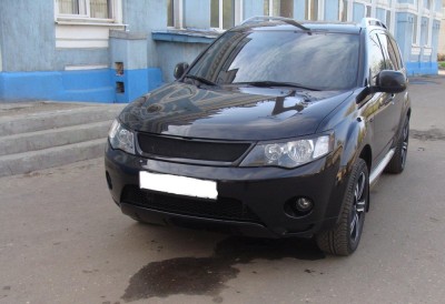 Pleoape faruri Mitsubishi Outlander 2 xl foto