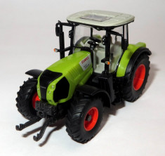 WIKING tractor CLAAS Arion 640 1:87 foto