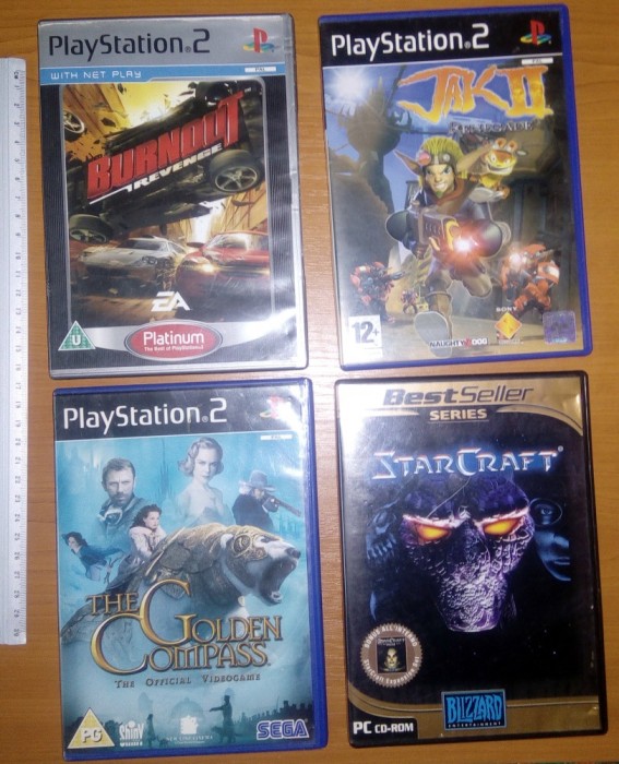 LOT 4 JOC PLAY STATION- BURNOUT ,JAK II ,STAR KRAFT, THE GOLDEN COMPASS