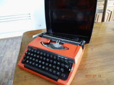 masina de scris superba rosie japan foto