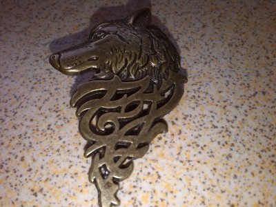 brosa pin bronz cap de lup foto