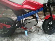 vand poket bike,,arata impecabil ,,motorul este nou ,porneste la prima sfoara .. foto