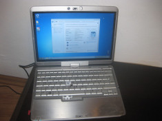 laptop HP COMPAQ 2710p core2duo u7600 /2 gb ddr2 /x3100 , fara hdd ,alimentator foto