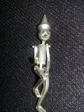 Figurina argintata de colectie tip Pinochio,deosebita,9,3gr,T.GRATUIT