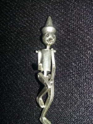 Figurina argintata de colectie tip Pinochio,deosebita,9,3gr,T.GRATUIT foto