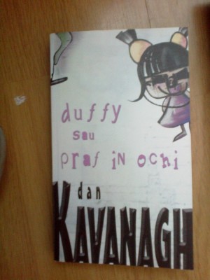 e1 DAN KAVANAGH - DUFFY SAU PRAF IN OCHI foto