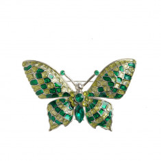 Brosa argintie, fluture verde foto
