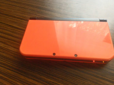 Consola New Nintendo 3DS XL nemodata cu multe jocuri. foto