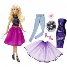 Papusa Barbie cu rochii moderne foto