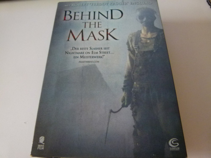 Behind the mask - dvd -410