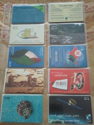 Lot 20 cartele telefonice Emiratele Arabe Unite + folie + taxele postale=30 roni foto