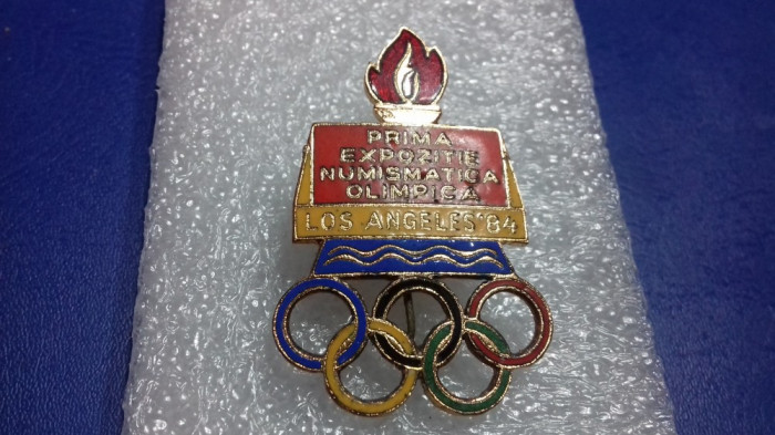 insigna Prima expozitie numismatica Olimpica Los Angeles 1984