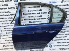 Usa,portiera stanga spate albastra originala BMW E90 atinsa foto