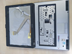 Dezmembrez laptop TOSHIBA L40 piese componente carcasa foto