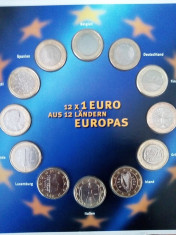 SET DE 12 BUCATI DE 1 EURO IN FOLIE, STARE UNC !! foto