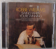 Robbie Williams - Swings When You&amp;#039;re Winning foto