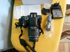 Nikon D5100 +obiectiv 18-55,stare f buna ,vine la cutie cu accesoriile din cutie foto