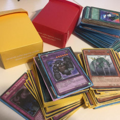 * 162 Cartonase Yu-Gi-Oh! Trading Card Game, in 2 cutii, majoritatea tiple