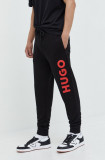 HUGO pantaloni de trening din bumbac bărbați, culoarea negru, cu imprimeu 50473211