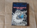 GREGORY BENFORD - NATURA MOARTA CU TIMP