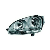Far VW Golf 5 (Hatchback / Combi) 10.2003-05.2009 Jetta 05.2004-09.2010 TYC partea Stanga tip bec H7+H7 fumuriu cu reflector gri
