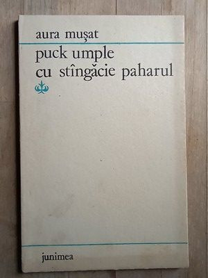 Puck umple cu stangacie paharul- Aura Musat