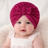 Caciulita roz ciclamen tip turban cu trei fundite (Marime Disponibila: 3-6 luni)