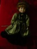 Papusa cap, maini,picioare portelan ,rochie neagra si verde ,par in coc,h=43cm