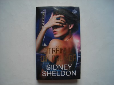 Strainul din oglinda - Sidney Sheldon foto