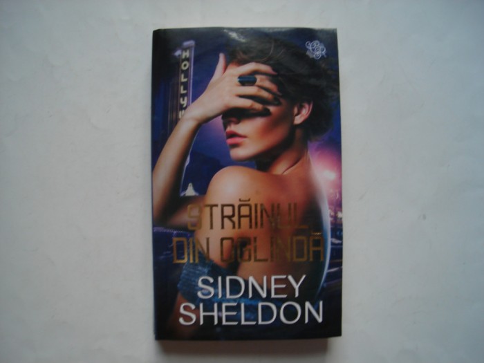 Strainul din oglinda - Sidney Sheldon