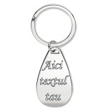 Breloc personalizat in forma ovala cu desfacator capace gravat cu textul tau