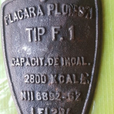 F56-Reclama veche soba Flacara Ploiesti metal 14/11 cm.