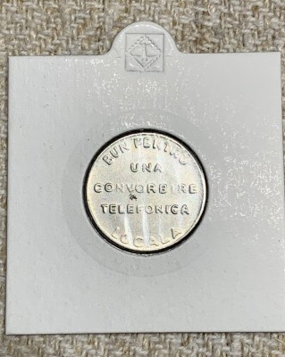 Jeton bun pentru una convorbire telefonică locală foto