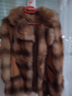 Haină de blană artificială foto